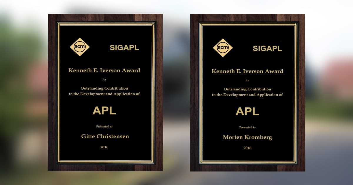 Two plaques for the 2016 Kenneth E. Iverson Award presented by ACM SIGAPL. One awarded to Gitte Christensen and the other to Morten Kromberg for outstanding contributions to the development and application of APL.